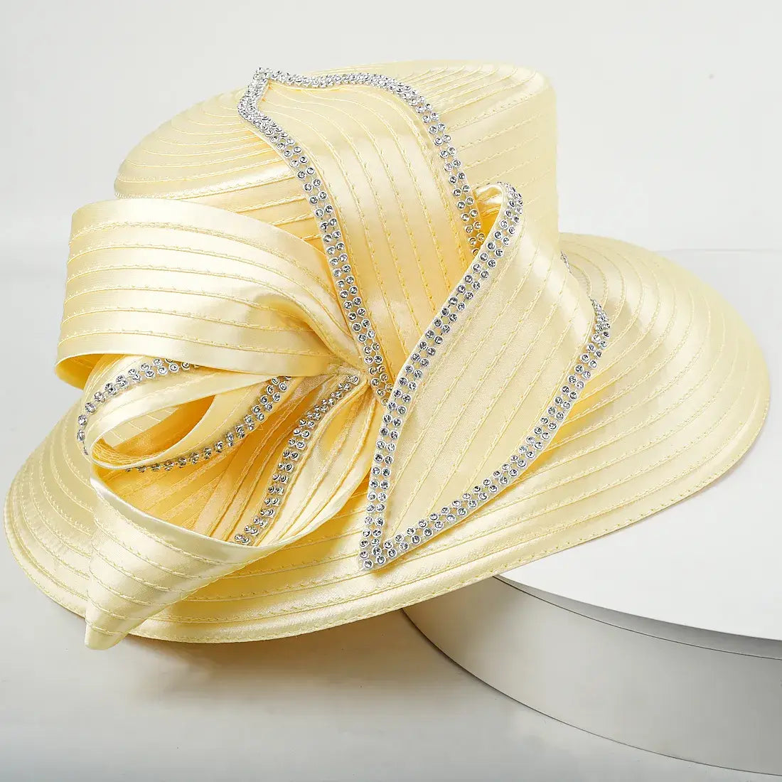 Side view of yellow satin church hat with sparkling rhinestone bow detail, ideal for formal church and formal events.