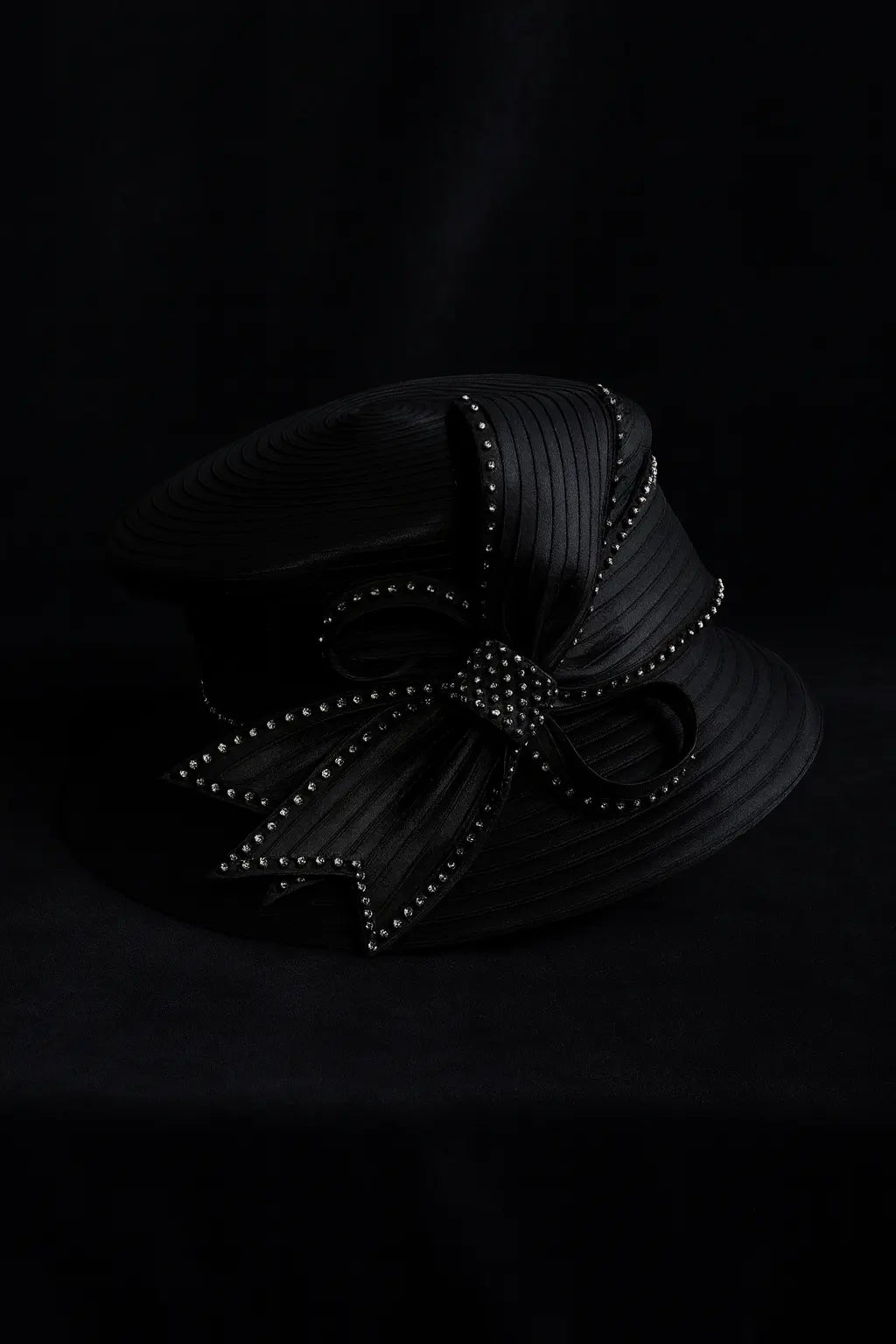 Sophisticated black women’s dress hat with wide rhinestone-trimmed bow, ideal for church and elegant occasions.