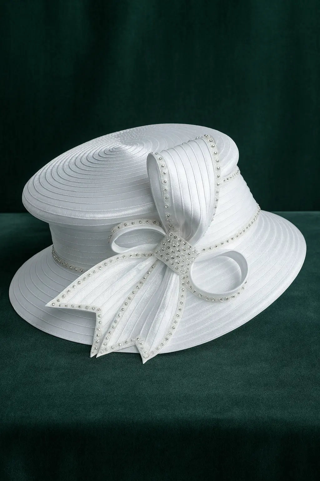 Graceful white formal church hat with rhinestone bow, perfect for women’s Sunday worship or wedding events.