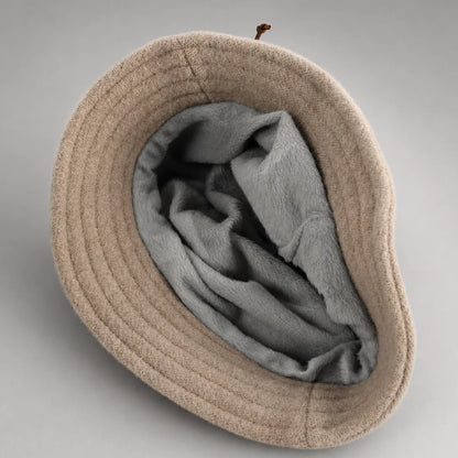 Interior of an Angora cloche hat showing full fleece lining and flexible all-around brim