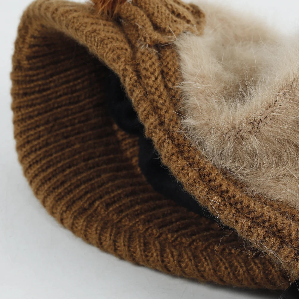 Beige angora blend visor beanie showing fleece-lined interior, ribbed knit brim, and soft fuzzy crown texture.