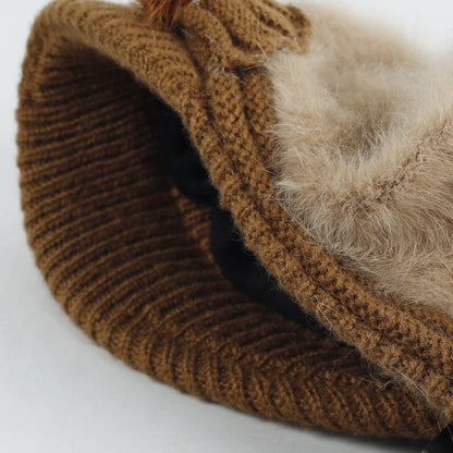Beige angora blend visor beanie showing fleece-lined interior, ribbed knit brim, and soft fuzzy crown texture.