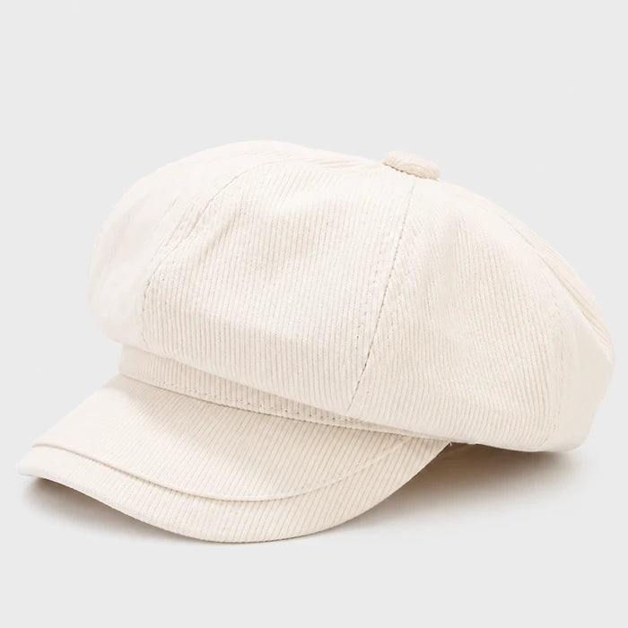 Beige Newsboy cap, a timeless baker boy hat with a vintage design, ideal for casual street style or a chic retro look.
