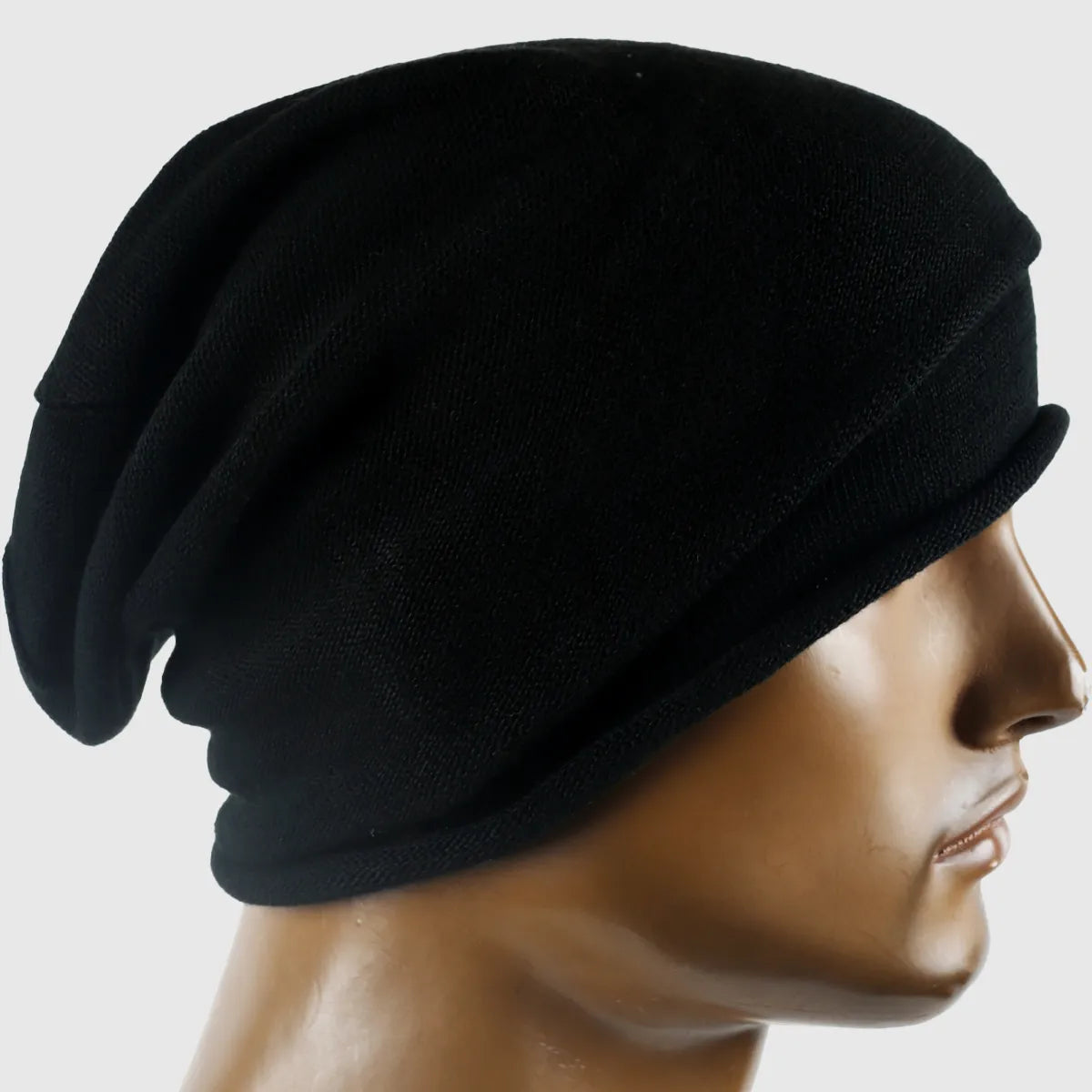 Black soft knit beanie hat for men and women, comfortable and breathable, perfect for winter and spring, stylish accessory for casual outfits.
