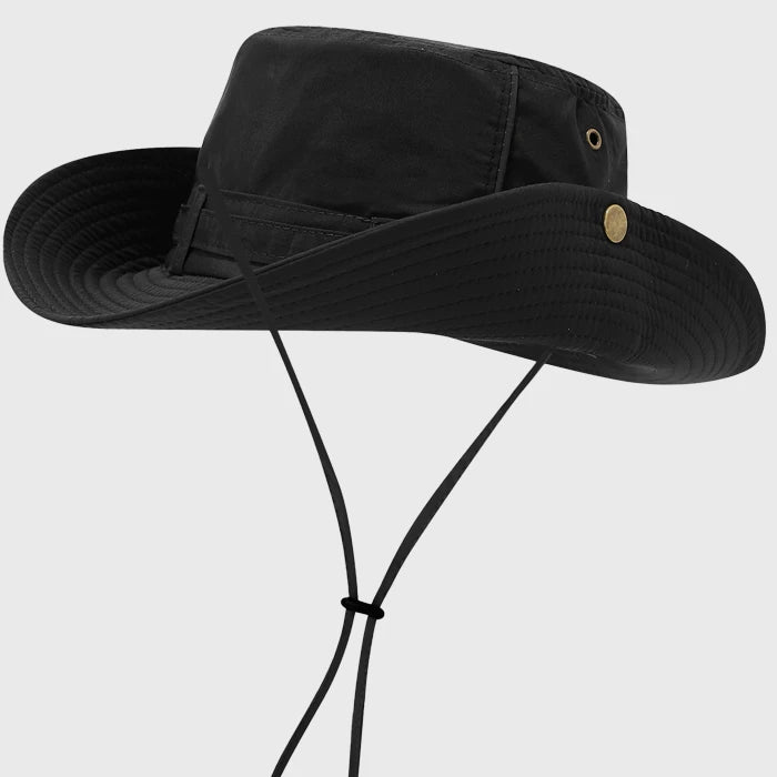 Black boonie hat with wide brim for sun protection. Features a chin strap and adjustable fit, perfect for outdoor activities like hiking, fishing, and camping.