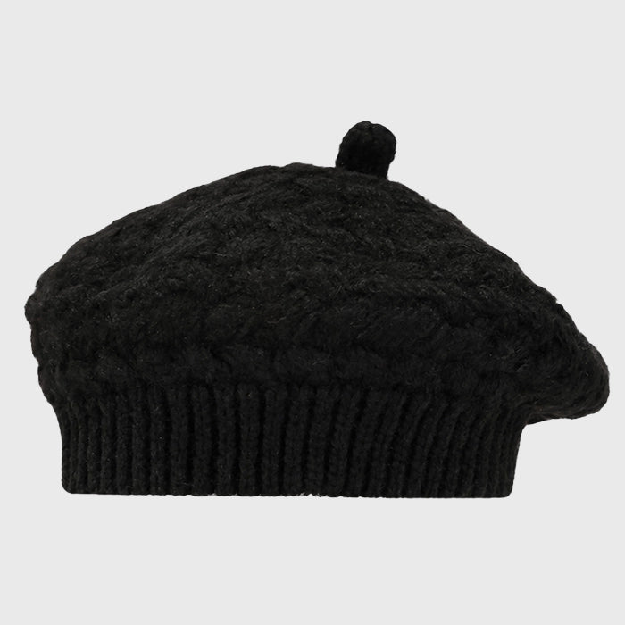 Black crochet cable knit beret for women, perfect for cozy winter days. Adjustable fit and warm design, ideal for casual and chic outfits.