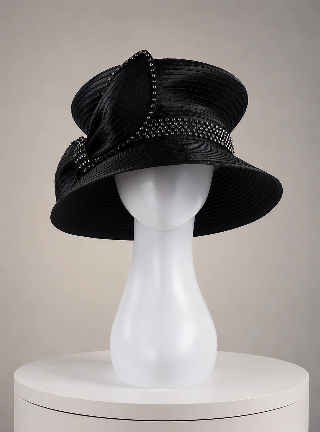 Front view black wide brim church hat with sparkling rhinestone trim and satin texture, classic formal women’s church hat design