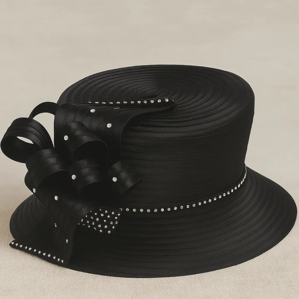 Elegant black funeral hat with rhinestone bow detail on white turntable, perfect for women’s funeral or formal events
