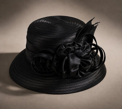 Flat lay of black cloche short brim church hat with ribbon flower, elegant and premium FORBUSITE hat