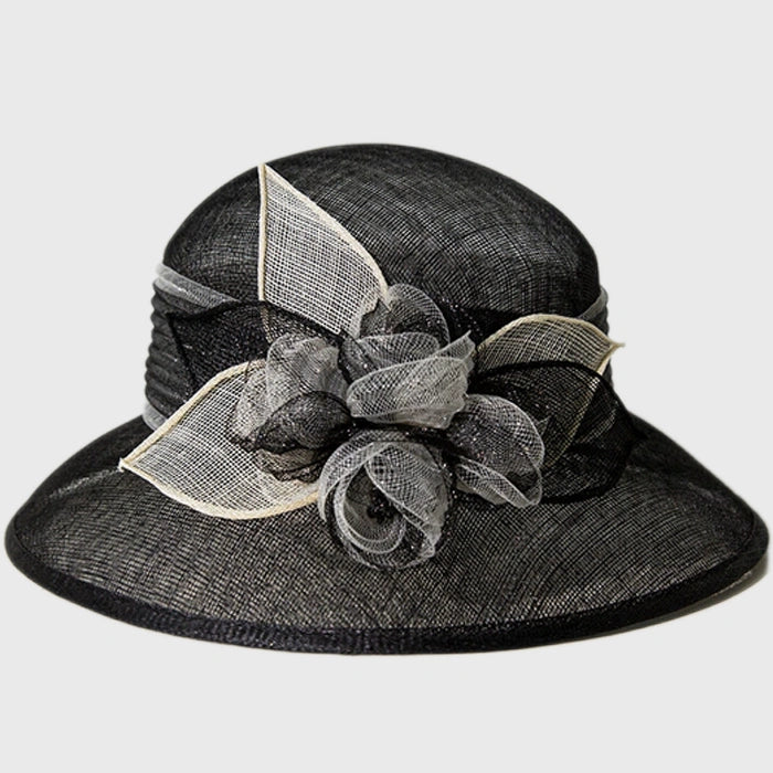 Elegant black cloche sinamay hat with black and white flower details, perfect for weddings, church services, and upscale events.