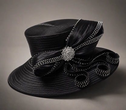 Black crystal embellished church hat with decorative ribbon loops and structured wide brim on neutral background