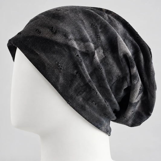 Black distressed slouchy beanie with a soft relaxed oversized fit