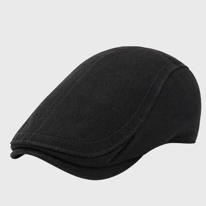 Classic black flat cap in cotton, providing a sharp and modern style. Ideal for both men and women, this Ivy cap suits any casual or semi-formal occasion.