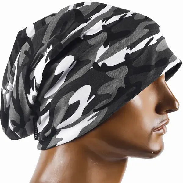 Black and gray camouflage baggy beanie hat worn on mannequin, unisex slouch fit cotton beanie for all seasons