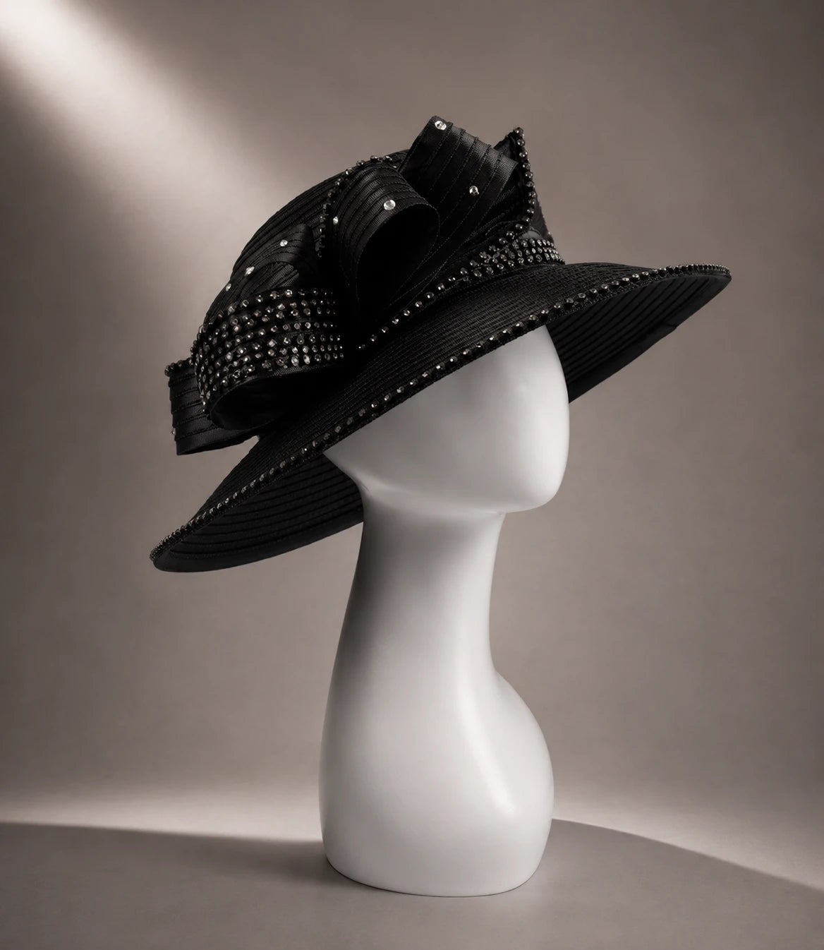 Side view of luxury black church hat featuring rhinestone embellishments and sculpted ribbon design