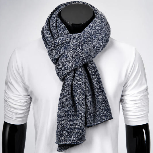 Black melange knit scarf on mannequin, soft ribbed texture for urban winter layering