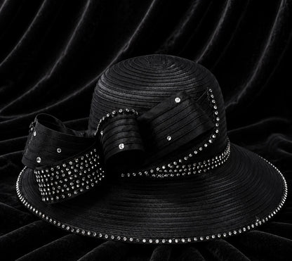 Black rhinestone Sunday church hat displayed on velvet background with elegant decorative bow details