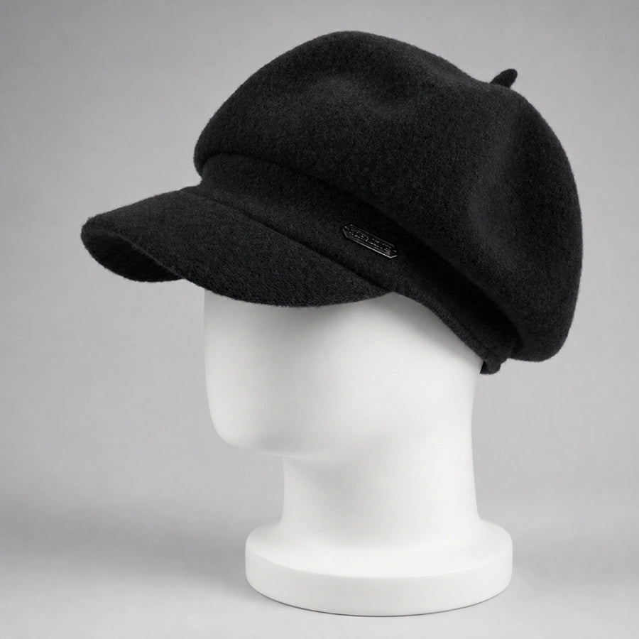 Black women’s wool newsboy cap with short visor on mannequin