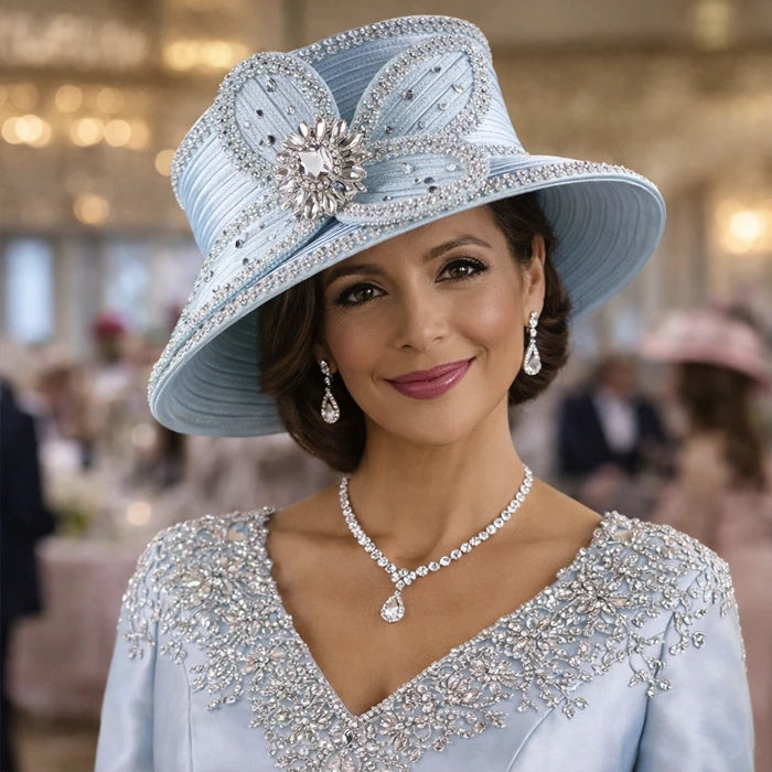Blue church hat with a floral crystal embellishment, great for upscale church services and elegant gatherings, by FORBUSITE.