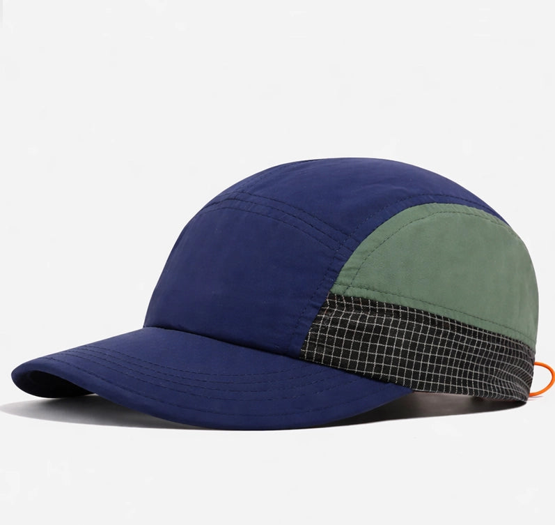Stylish blue and green outdoor sport cap with quick-dry fabric and UV protection, providing comfort and sun shielding for running, hiking, and sports.