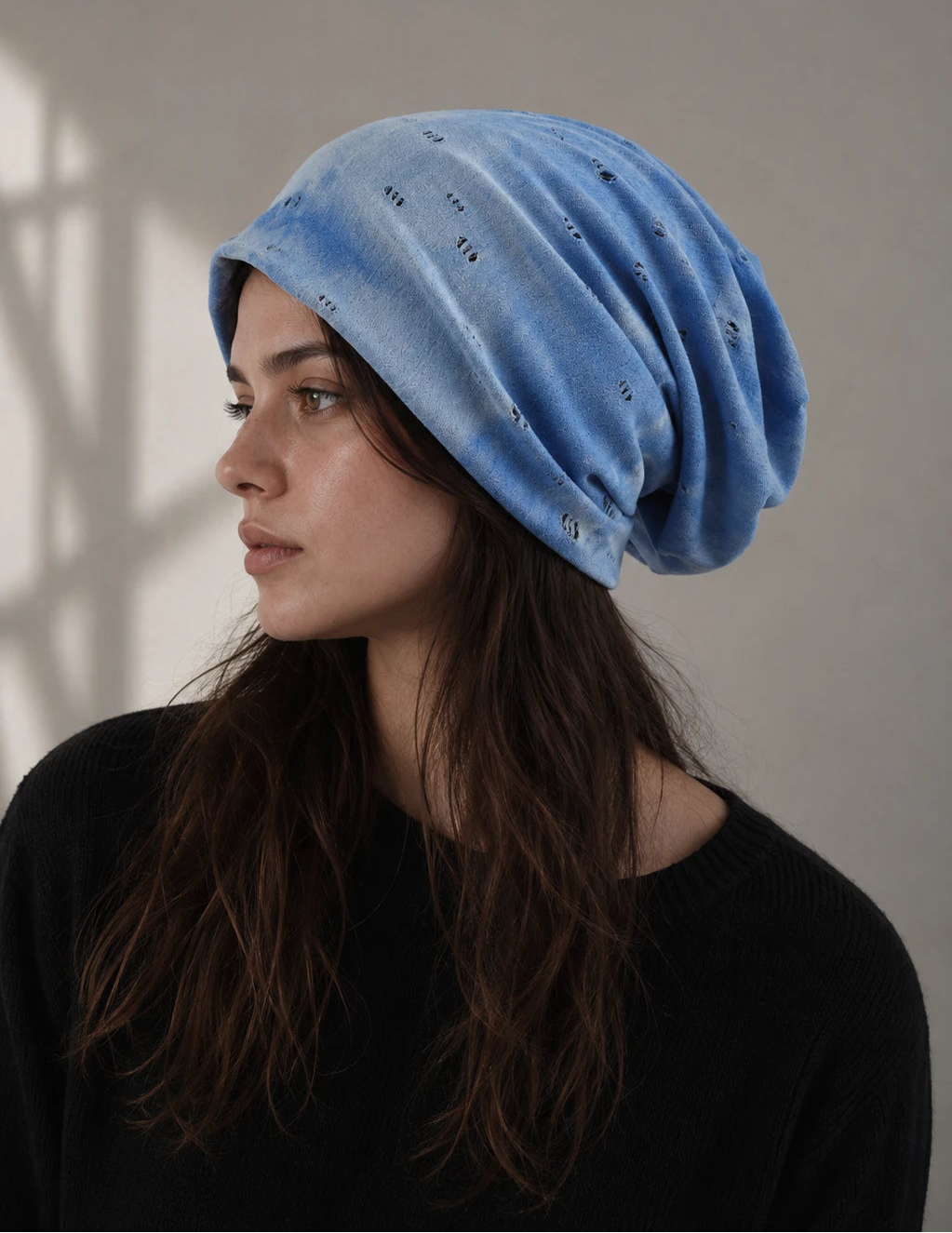 Blue slouchy beanie for women with lightweight distressed fabric, oversized casual fit and easy all season lifestyle styling
