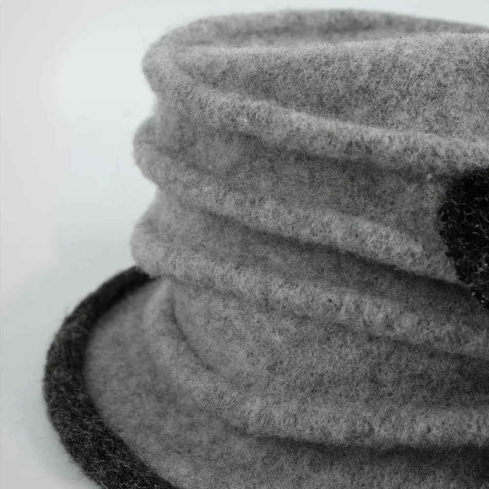 Close-up of the boiled wool felt surface and horizontal ruching