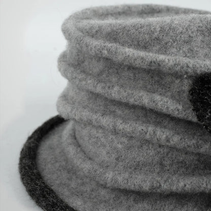 Close-up of the boiled wool felt surface and horizontal ruching