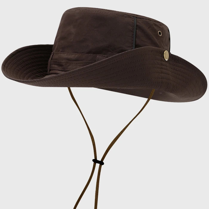 Brown boonie hat with adjustable chin strap and wide brim, providing excellent sun protection for hiking, fishing, and other outdoor adventures.