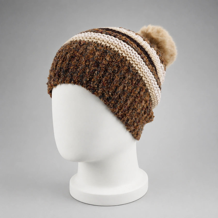 Brown striped knit pom pom beanie on a white mannequin