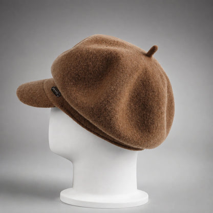Back side view of brown wool newsboy cap showing soft beret-style crown