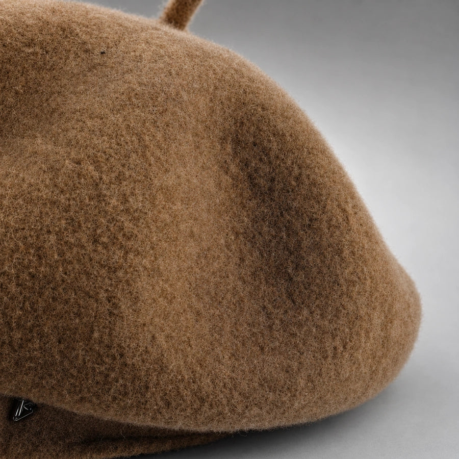 Close-up of brown 100 percent wool cap crown texture