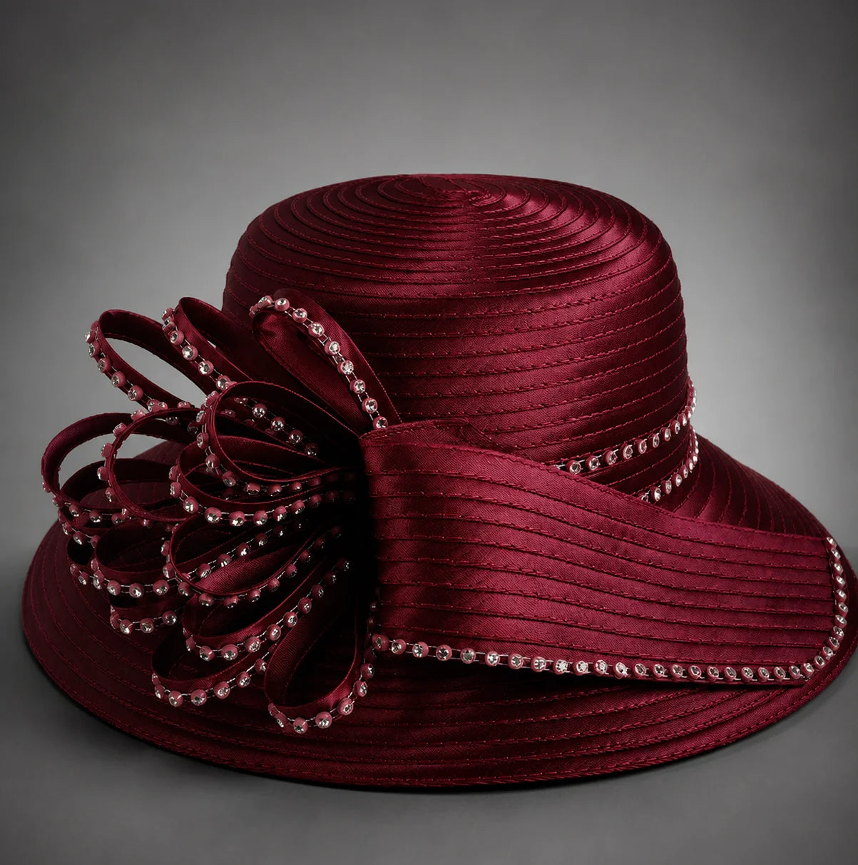 Burgundy church hat product detail with rhinestone bow and wide brim structure