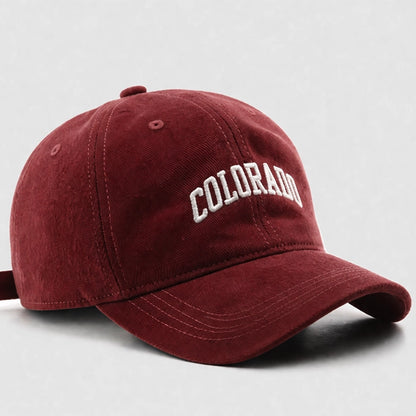 Burgundy 'COLORADO' embroidered baseball cap, ideal for casual street style and sports-inspired looks.