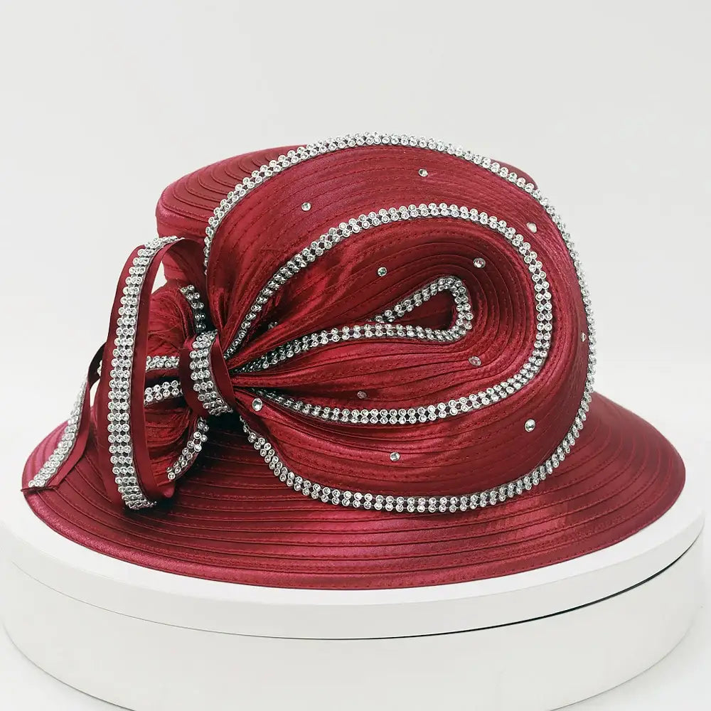 Elegant burgundy church hat with flower accent, perfect for Sunday service or wedding guest outfit.