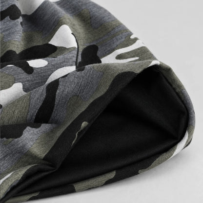 Close-up of the black rayon lining inside a camouflage slouchy beanie