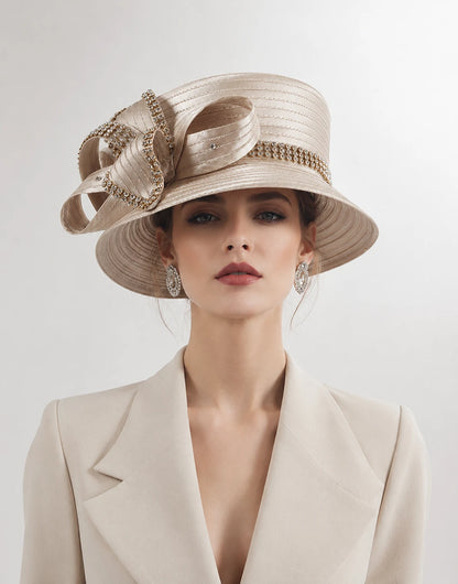 Elegant female model wearing champagne church hat with rhinestone embellishments, paired with formal outfit, perfect for luxury church fashion