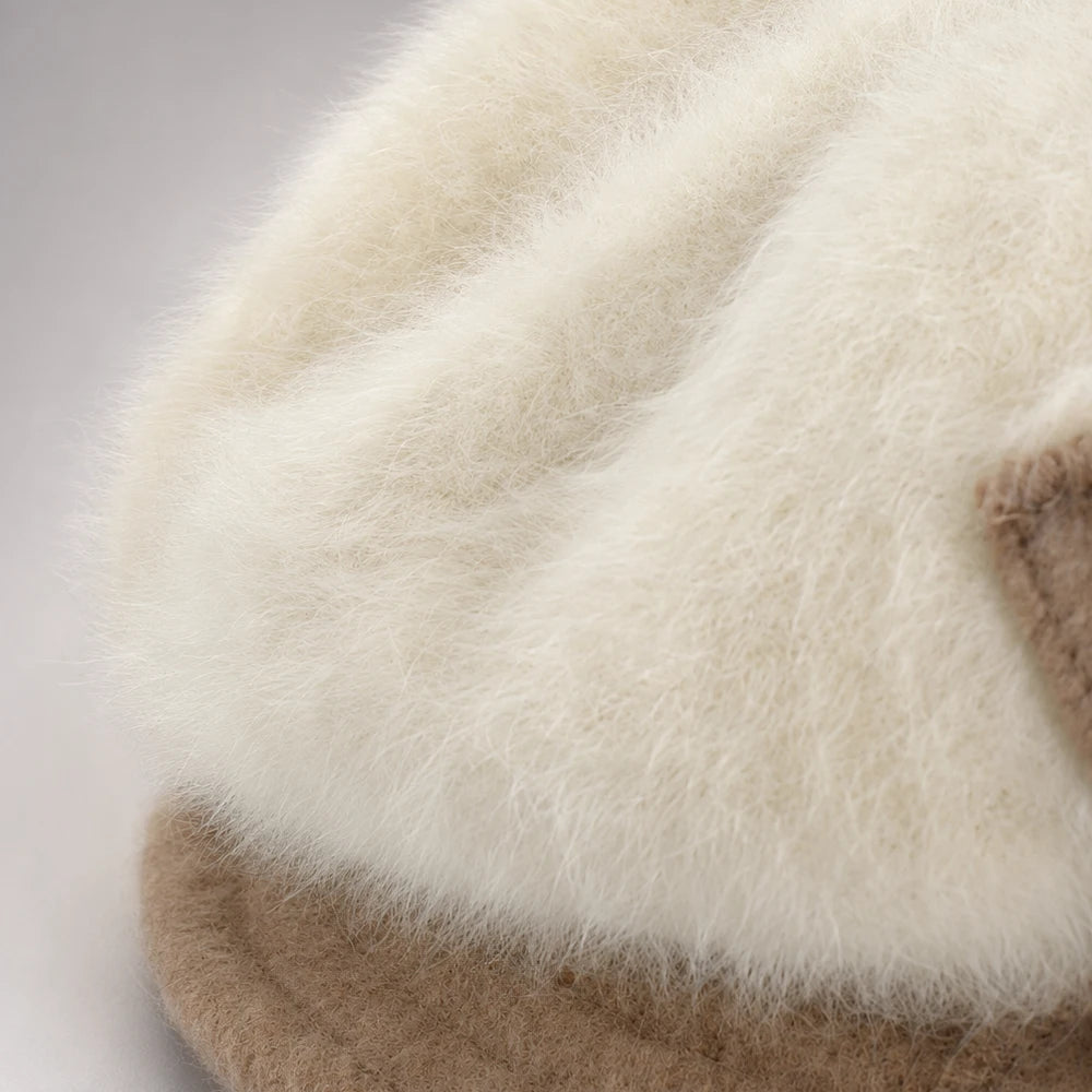 Close-up of the soft fuzzy Angora crown surface on a cream cloche hat