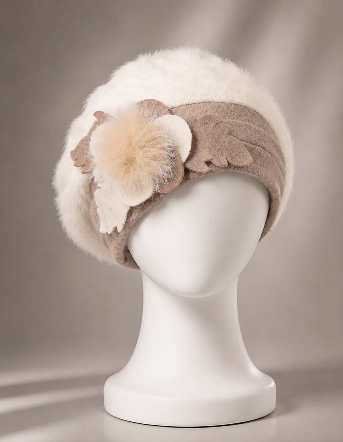Cream angora wool beret with soft flower accent for elegant winter outfits