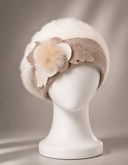 Cream angora wool beret with soft flower accent for elegant winter outfits