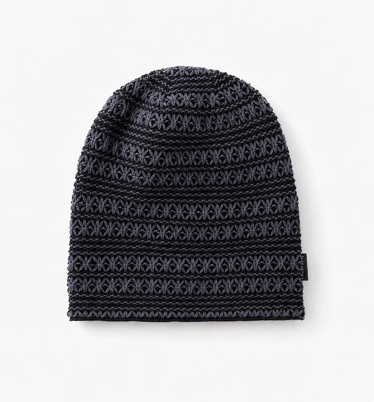 Dark grey luxury slouchy beanie with textured crochet knit pattern and relaxed fit