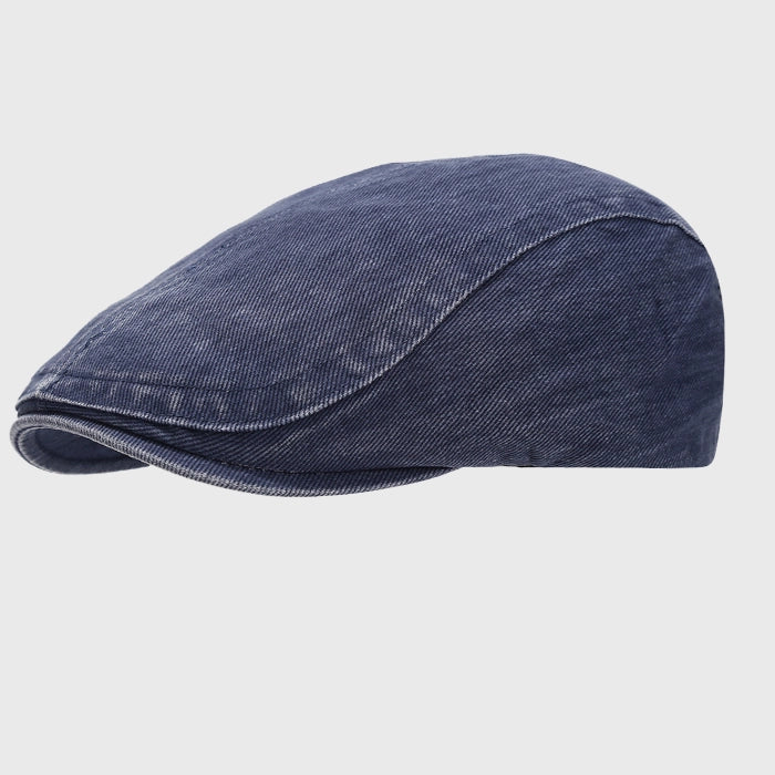 Distressed flat cap, adjustable for comfortable fit. Unisex ivy cap ideal for casual wear, offering a vintage washed look for a timeless style.