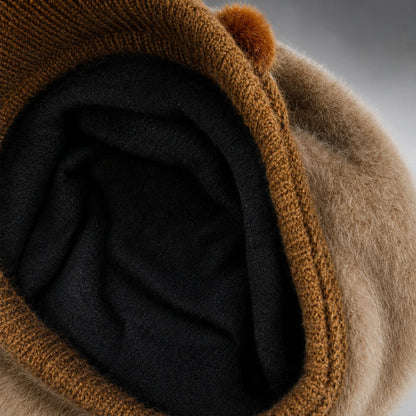 Fleece-lined interior of a women’s angora-blend knit visor beanie