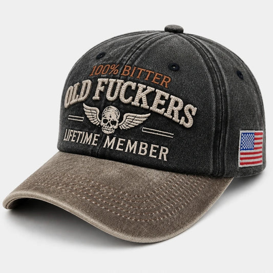 Front view of FORBUSITE vintage washed black baseball cap featuring "100% Bitter Old Fuckers Club" and winged skull embroidery.