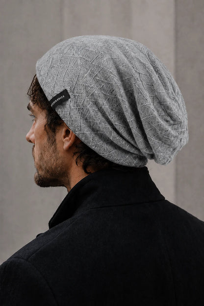 FORBUSITE gray geometric knit slouchy beanie showing relaxed back drape