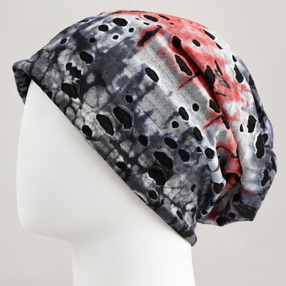Gray, red and white tie-dye B077 beanie on a white mannequin, with distressed cutouts and a relaxed slouch.