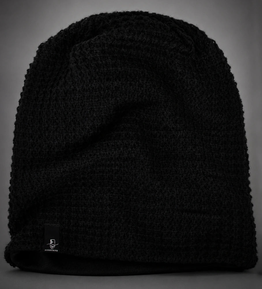 Black slouchy beanie cap with loose long fit, versatile knit hat for winter, summer and everyday wear