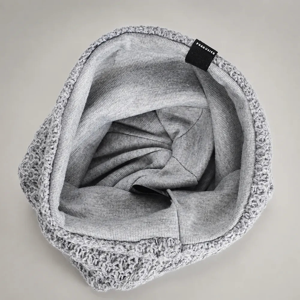 Light gray slouchy knit beanie interior showing soft inner lining, stretch opening and comfortable everyday fit