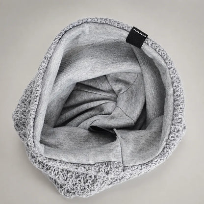 Light gray slouchy knit beanie interior showing soft inner lining, stretch opening and comfortable everyday fit