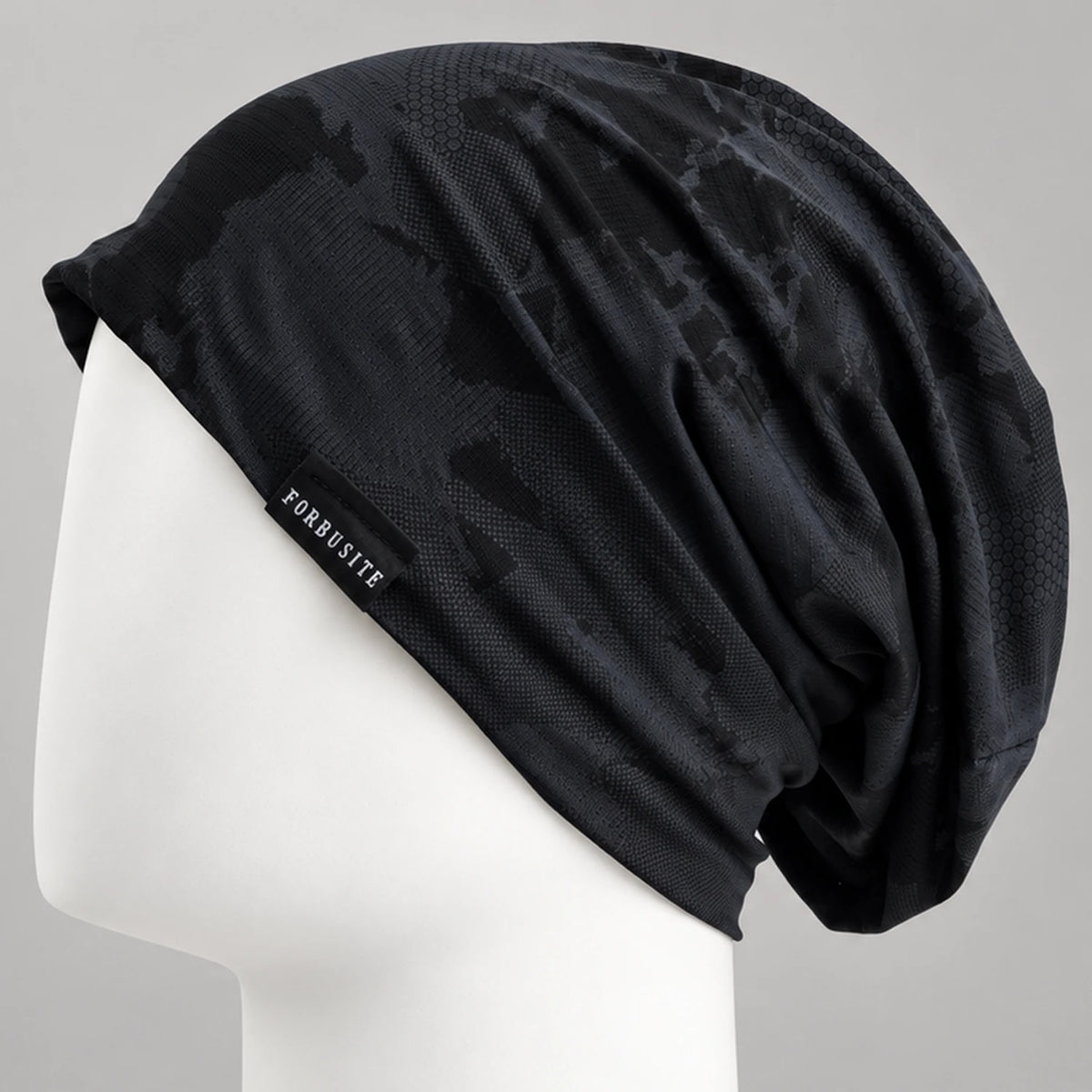 Black lightweight slouchy beanie with subtle tonal pattern and soft drape