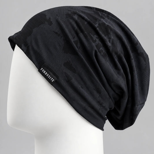 Black lightweight slouchy beanie with subtle tonal pattern and soft drape